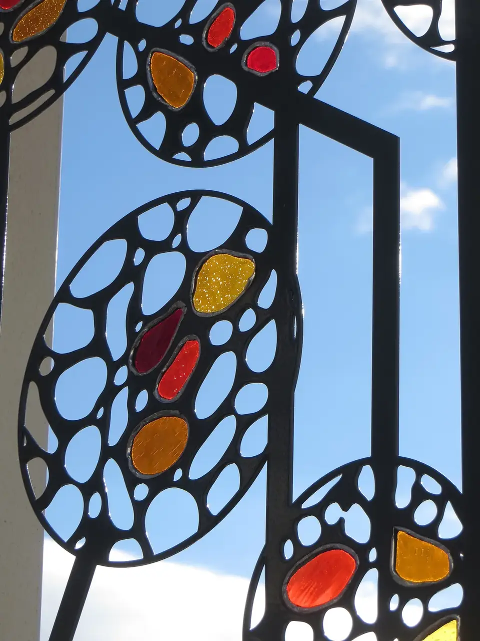 Laser-cut steel grilles with glass