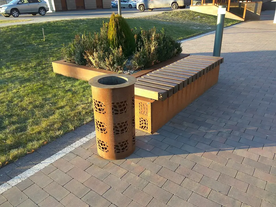 Bench and bin with cut patterns